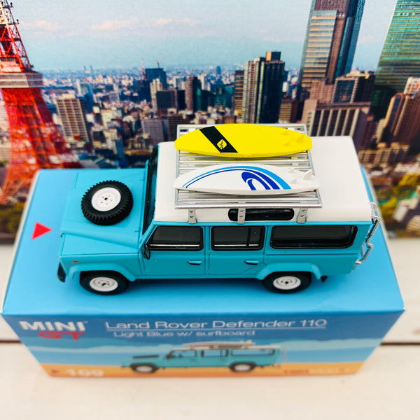 MINI GT 1/64 Land Rover Defender 110 Light Blue w/ Surfboard RHD