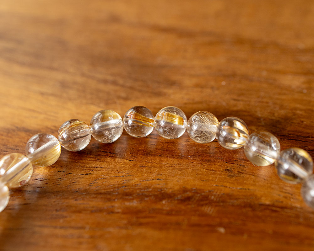楽天市場】リビアングラス 九眼天珠 ゴールデンルチルクォーツ