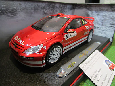PEUGEOT 307 WRC RALLYE # 5 GRONHOLM rouge au 1/18 MAISTO 38693