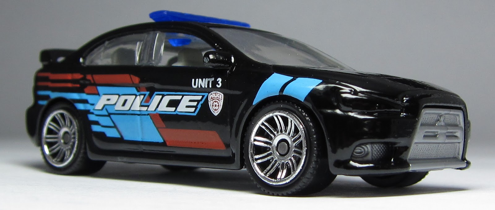 First Look: Matchbox Mitsubishi Lancer Evo X Police & Subaru