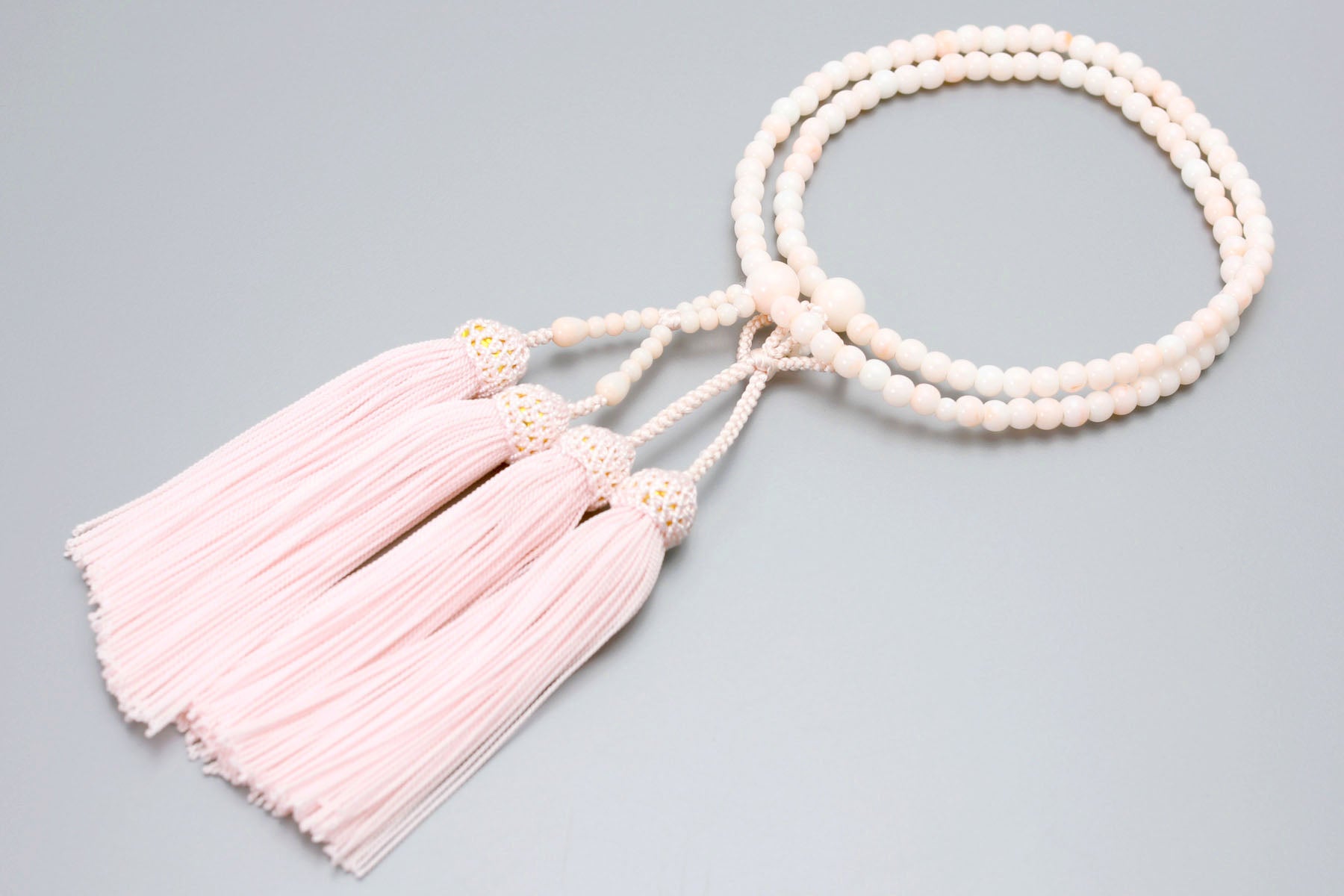 数珠 女性用 二連 京匠の伝統 ピンク珊瑚二輪 人絹頭房 浄土真宗 仏壇